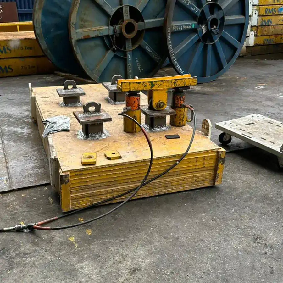 A yellow machine with a yellow box on top of it.